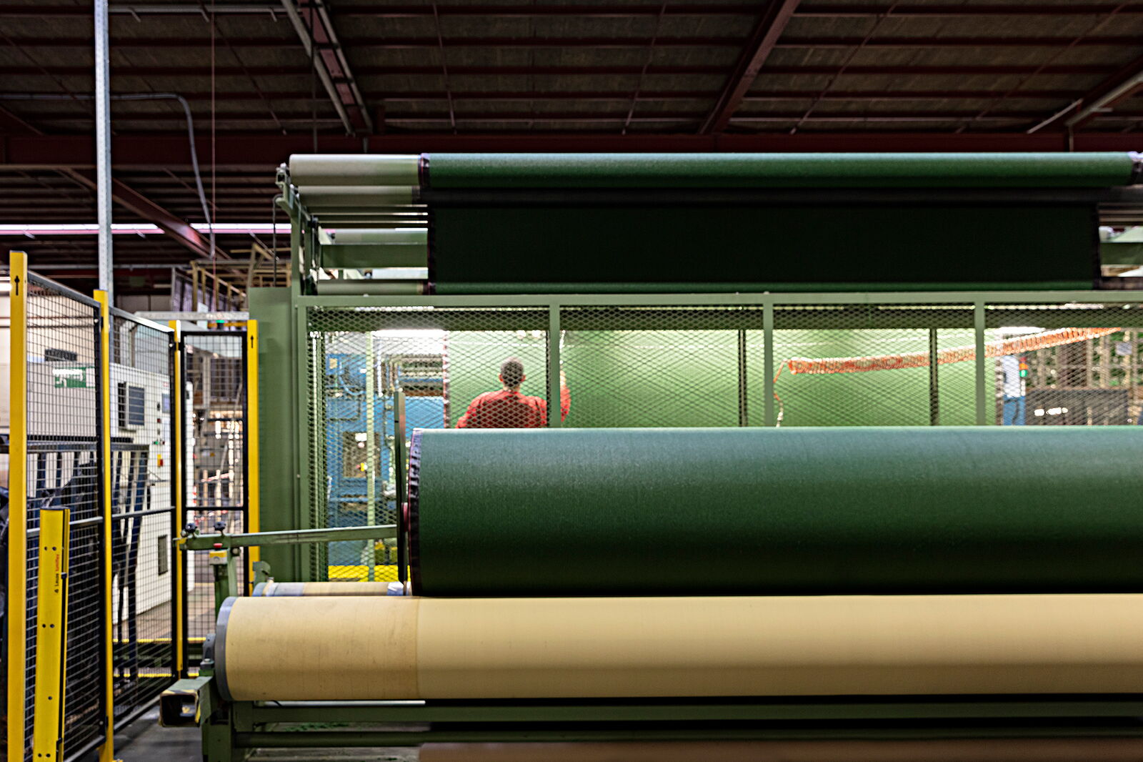 Factory tufting machine - Ball on green turf field - Act Sports, the Premium Artificial Sports Turf Supplier